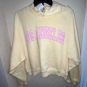 Self Esteem Cropped Hoodie in Pale Yellow with Pink 'Los Angeles' Print